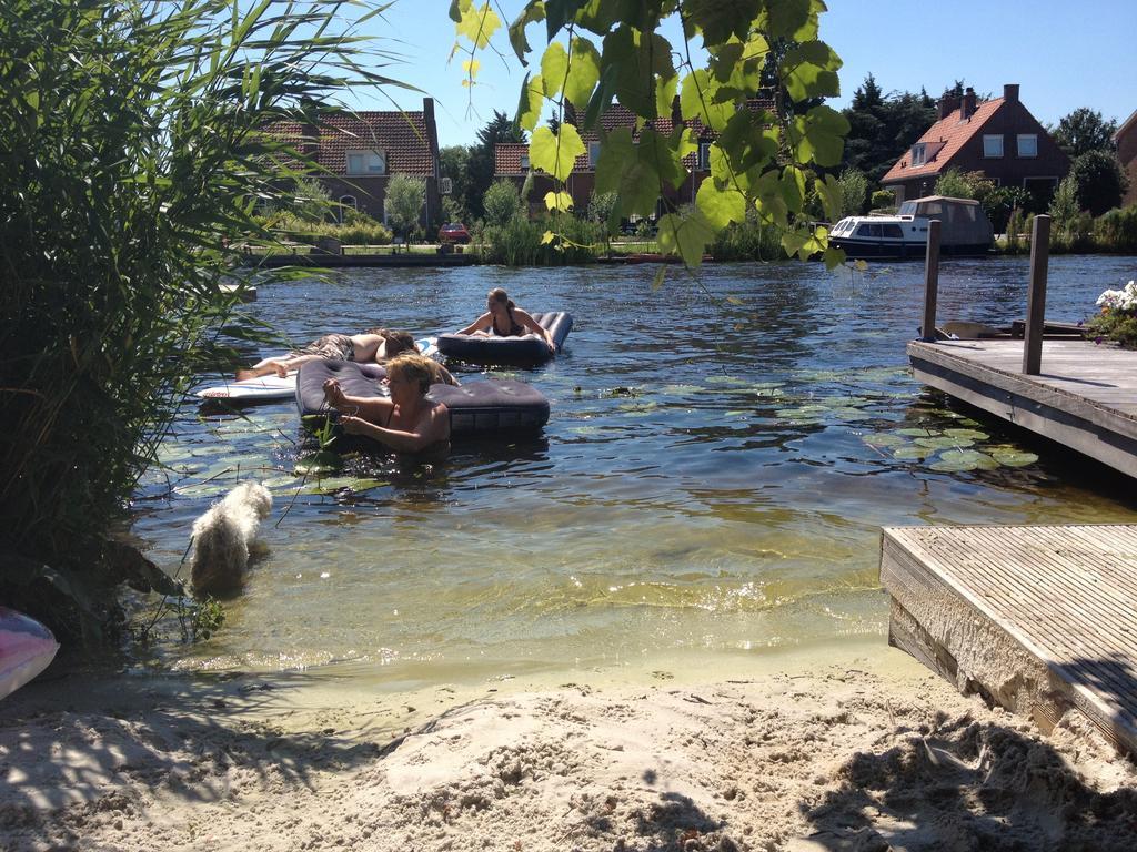 Houseboat Between Windmills