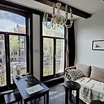Joyjoyjoy The Black Beauty Ecolicious Studio In A Canal House With French Balcony With View On The Canals